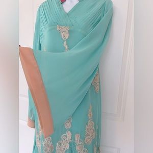 Beautiful sky blue gown with bell sleeves